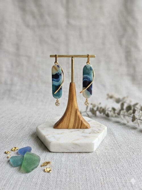Polymer clay and stainless steel details.