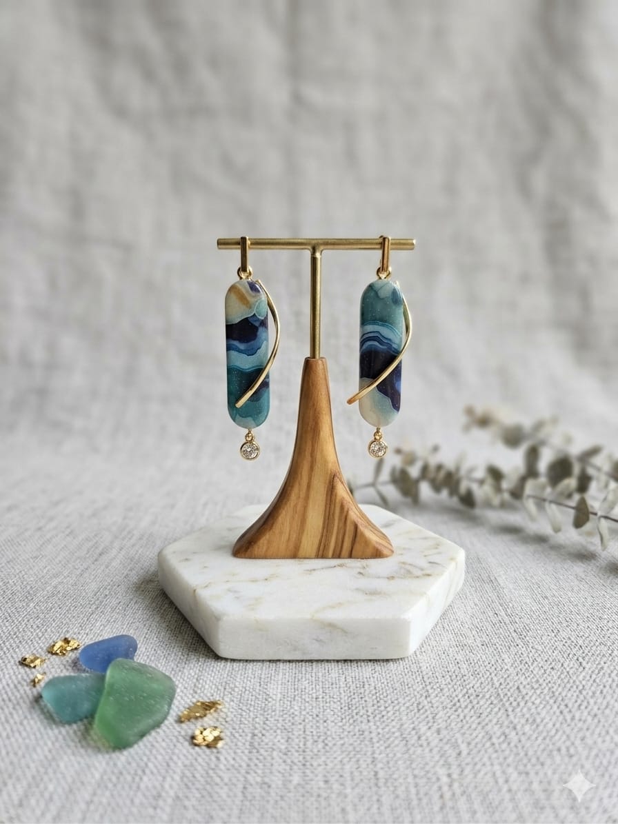 Polymer clay and stainless steel details.