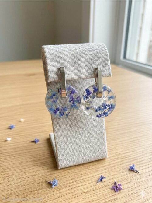 Pressed flower in resin and steinless steel hoop